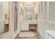 Full bathroom with carpet, mirror, cabinets, and shower at 11 Forrest Pl, Atlanta, GA 30328