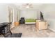 Spacious bedroom with carpet, fan, and tv at 11 Forrest Pl, Atlanta, GA 30328