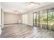 Bright living room with modern flooring and large windows showcasing outdoor views at 11 Forrest Pl, Atlanta, GA 30328