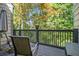 Relaxing outdoor patio with chairs and a view of lush greenery at 11 Forrest Pl, Atlanta, GA 30328