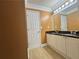 Bathroom with double sinks and large mirror at 1417 Wind Chime Ct, Lawrenceville, GA 30045