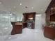 Gourmet kitchen with granite countertops, custom cabinets, and stainless steel appliances at 1417 Wind Chime Ct, Lawrenceville, GA 30045