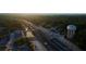 Overhead shot of a transit hub surrounded by lush greenery and roads at sunrise at 156 Martha Ne Ave, Atlanta, GA 30317