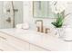 Bathroom vanity features bronze faucet and fixtures, marble countertops and tile backsplash at 156 Martha Ne Ave, Atlanta, GA 30317