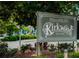 Welcome to Kirkwood sign surrounded by lush landscaping and greenery, highlighting the neighborhood's established charm at 156 Martha Ne Ave, Atlanta, GA 30317