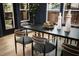 Dining area boasts a dark wood table with seating for six and ample natural light at 156 Martha Ne Ave, Atlanta, GA 30317