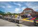 Spacious outdoor venue with food stalls, colorful seating areas, and lively atmosphere at 156 Martha Ne Ave, Atlanta, GA 30317