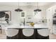 Modern kitchen with a large center island and stylish pendant lighting at 156 Martha Ne Ave, Atlanta, GA 30317