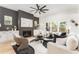 Inviting living room with fireplace, comfortable seating, and large windows at 156 Martha Ne Ave, Atlanta, GA 30317