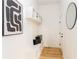 Mudroom with built-in bench seating, storage cubbies, and white walls at 156 Martha Ne Ave, Atlanta, GA 30317