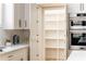 Kitchen with walk-in pantry and built-in stainless steel appliances at 156 Martha Ne Ave, Atlanta, GA 30317