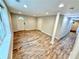 Finished basement featuring recessed lighting, wood-look tile, and a separate entrance at 2429 Sherbrooke Ne Ct, Atlanta, GA 30345