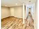 Finished basement featuring recessed lighting, wood-look tile, and neutral paint at 2429 Sherbrooke Ne Ct, Atlanta, GA 30345