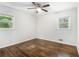 This bedroom features hardwood floors, white walls and dual windows at 2429 Sherbrooke Ne Ct, Atlanta, GA 30345