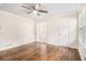 Bright bedroom features hardwood floors, fresh paint, and a ceiling fan at 2429 Sherbrooke Ne Ct, Atlanta, GA 30345