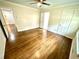 Spacious bedroom with hardwood floors, neutral paint, and ceiling fan at 2429 Sherbrooke Ne Ct, Atlanta, GA 30345