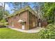 Charming two-story brick home surrounded by lush greenery and mature trees at 2429 Sherbrooke Ne Ct, Atlanta, GA 30345