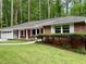 Charming brick home with a well-manicured lawn and inviting driveway at 2429 Sherbrooke Ne Ct, Atlanta, GA 30345
