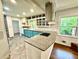 Stylish kitchen with unique cabinetry, granite countertops, and modern appliances at 2429 Sherbrooke Ne Ct, Atlanta, GA 30345