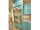 Close-up of kitchen stainless steel double ovens with custom painted cabinets at 2429 Sherbrooke Ne Ct, Atlanta, GA 30345