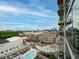 Expansive city view showcasing nearby shops, skyline, and a beautiful blue swimming pool in the foreground at 361 17Th Nw St # 1222, Atlanta, GA 30363