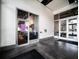 Entrance to a modern coffeehouse with glass doors, and inviting atmosphere at 361 17Th Nw St # 1222, Atlanta, GA 30363