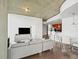 Open concept living area with hardwood floors, kitchen, and large windows at 361 17Th Nw St # 1222, Atlanta, GA 30363