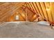 Large unfinished attic space with exposed beams and wooden flooring, perfect for storage or conversion at 239 Trail Nw Rd, Marietta, GA 30064