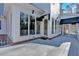 The back deck area is well-lit by windows that offer views of the wooded backyard at 239 Trail Nw Rd, Marietta, GA 30064