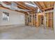 Unfinished basement featuring exposed ceiling and framing at 239 Trail Nw Rd, Marietta, GA 30064