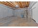 Unfinished basement showing concrete walls and utility fixtures and pipes at 239 Trail Nw Rd, Marietta, GA 30064