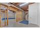 Partially finished basement with stairs leading to the upper level at 239 Trail Nw Rd, Marietta, GA 30064