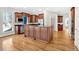 A gourmet kitchen boasts custom cabinets, granite countertops and stainless appliances at 239 Trail Nw Rd, Marietta, GA 30064