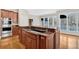 A kitchen island featuring granite countertops and stainless steel appliances at 239 Trail Nw Rd, Marietta, GA 30064