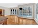 An open living space with large windows and access to an outdoor deck at 239 Trail Nw Rd, Marietta, GA 30064