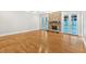 Open living space featuring hardwood floors and a stone fireplace at 239 Trail Nw Rd, Marietta, GA 30064