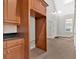 Pantry and entry featuring hardwood cabinetry, tile floors, and natural light from the entry at 239 Trail Nw Rd, Marietta, GA 30064