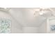 Spacious bedroom featuring a vaulted ceiling and bright windows at 2480 Flint Creek Dr, Cumming, GA 30041