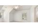 Bedroom with natural light and neutral tones at 2480 Flint Creek Dr, Cumming, GA 30041