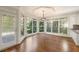 Bright breakfast nook with large windows and hardwood floors at 2480 Flint Creek Dr, Cumming, GA 30041