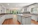 Well-appointed kitchen with granite countertops, stainless steel appliances, and hardwood floors at 2480 Flint Creek Dr, Cumming, GA 30041