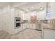 Well-equipped kitchen with stainless steel appliances and ample cabinet space at 2480 Flint Creek Dr, Cumming, GA 30041