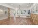 Spacious living area featuring a built-in window bench and stone pillar at 2480 Flint Creek Dr, Cumming, GA 30041