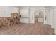Beautiful finished basement featuring wood floors and a stone accent wall at 2480 Flint Creek Dr, Cumming, GA 30041