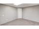 Finished basement with grey walls, white trim, carpet, and a white door at 2981 Cardinal Lake Dr, Duluth, GA 30096