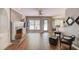 Charming living room with fireplace, built-ins, and views to the dining area at 2981 Cardinal Lake Dr, Duluth, GA 30096