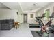 Finished basement with home gym including a Peloton and treadmill, as well as living and storage spaces at 3925 Rock Mill Pkwy, Marietta, GA 30062