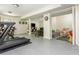 Finished basement featuring a workout area, storage, and a play area at 3925 Rock Mill Pkwy, Marietta, GA 30062
