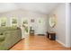 Light-filled living room with hardwood floors and a view of the outdoors at 3925 Rock Mill Pkwy, Marietta, GA 30062