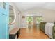 Inviting living room with hardwood floors and open entryway, filled with natural light at 3925 Rock Mill Pkwy, Marietta, GA 30062